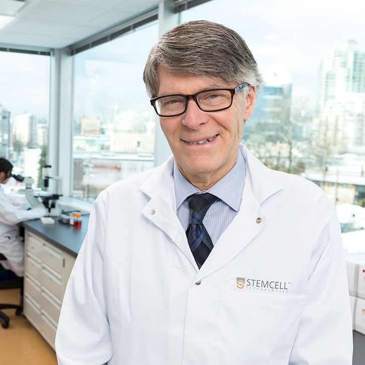 Dr. Allen Eaves portrait in a lab.
