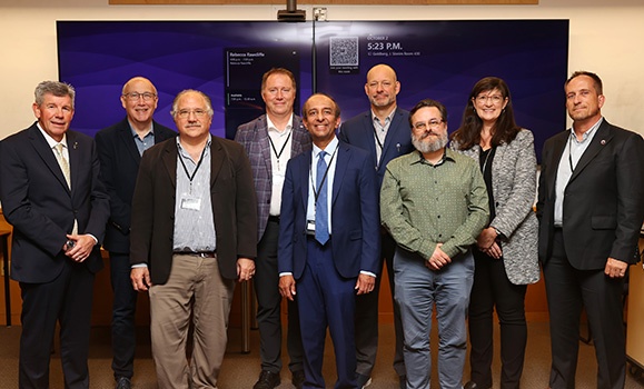 Dr. Srini Sampalli, centre, poses with Dal colleagues and external partners at a launch event this month for a new cybersecurity initiative at Dal. (Nick Pearce photos)