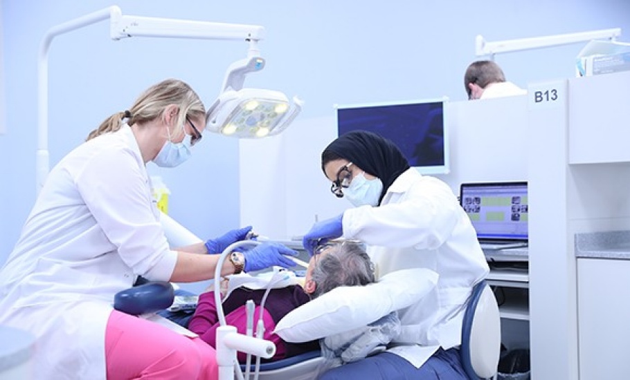 Student treating patient