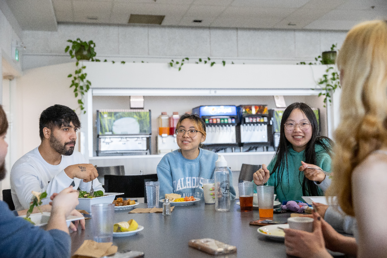 Students sharing a meal in the Truro cafeteria.